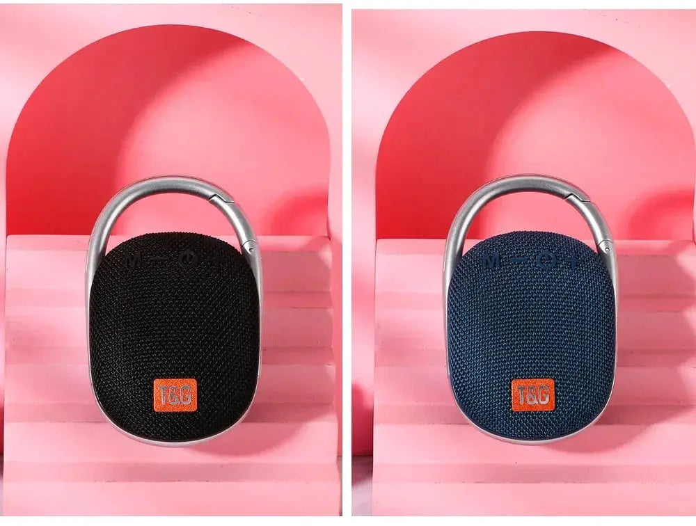 Pair of TG321 outdoor portable waterproof Bluetooth fabric speakers with orange TG logo; black and blue.