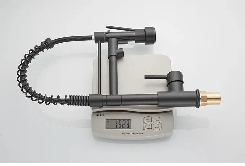 Kitchen faucet with pull-down sprayer by Simples Market, matte black, high-arc, single-handle.