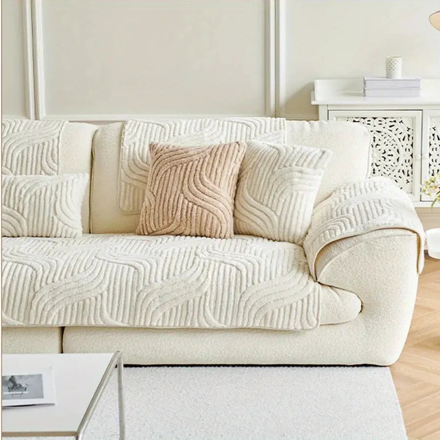 Velvet cream sofa cover with striped quilted pattern, non-slip couch protector by Simples Market.