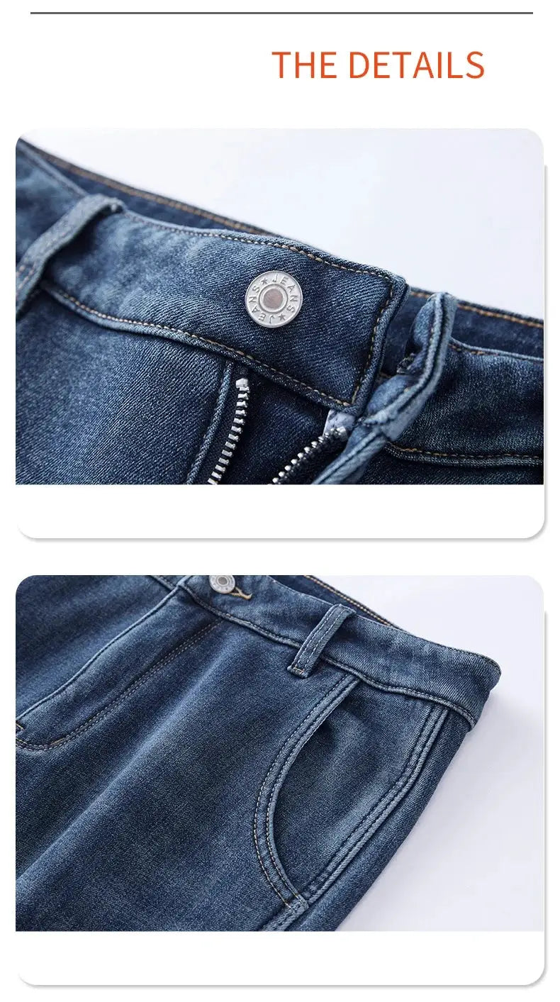 Men's dark blue denim jeans with metal button, zipper fly, and front pockets.