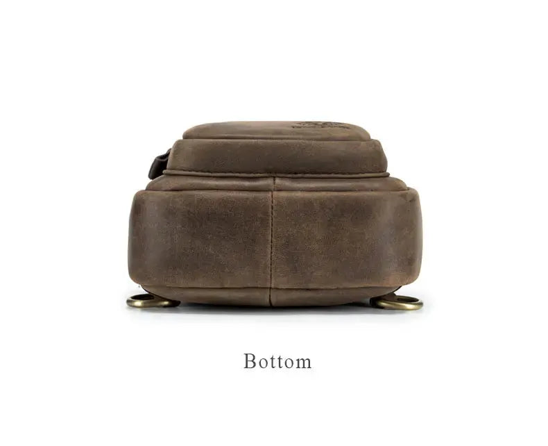 SCHLATUM chest bag in brown genuine leather; bottom view with metal ring attachments