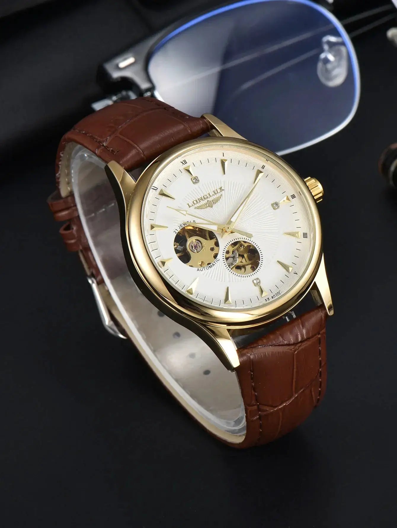 Simples Market automatic skeleton watch with gold-tone case and brown leather strap