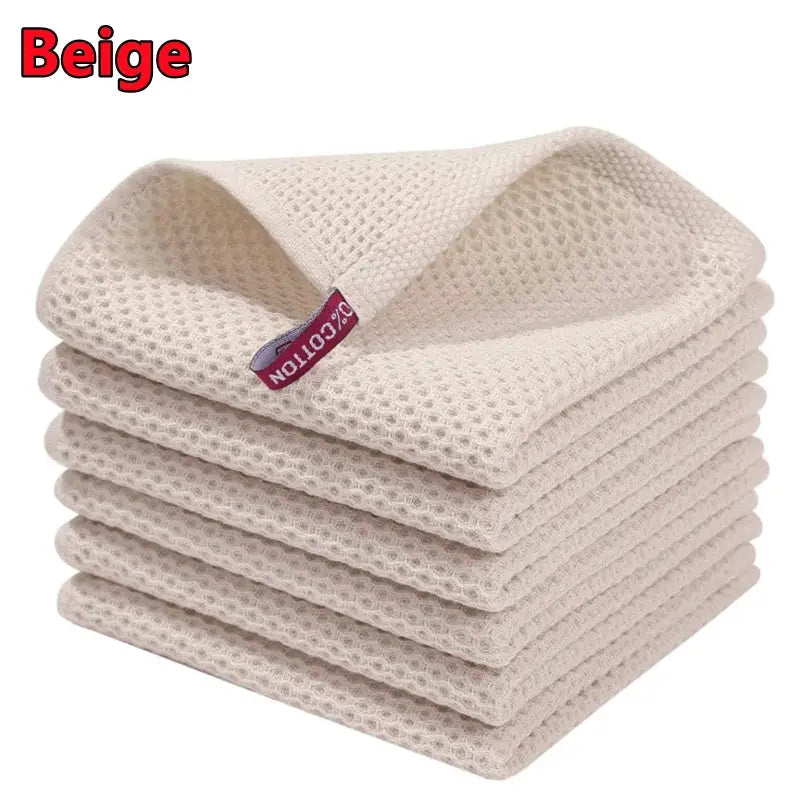 Beige 100% cotton dishcloths stacked for kitchen use, ultra soft absorbent