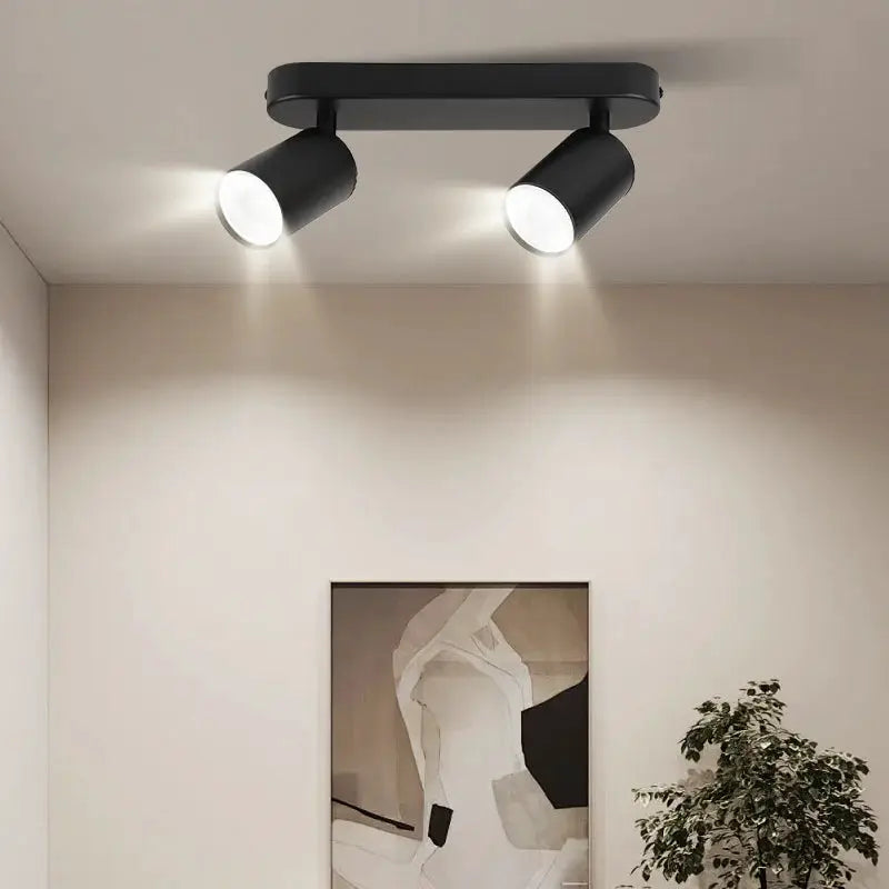 Modern GU10 LED ceiling spotlight fixture with two adjustable black spotlights