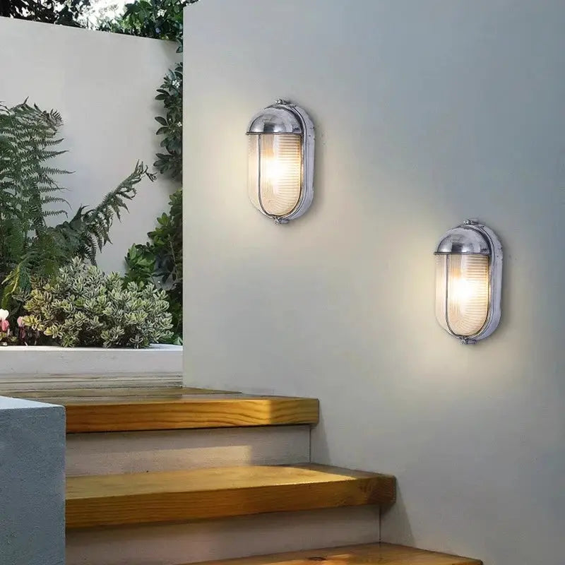 Outdoor retro LED wall lamps (2-pack) with glass shades and weathered metal finish, IP65 waterproof.