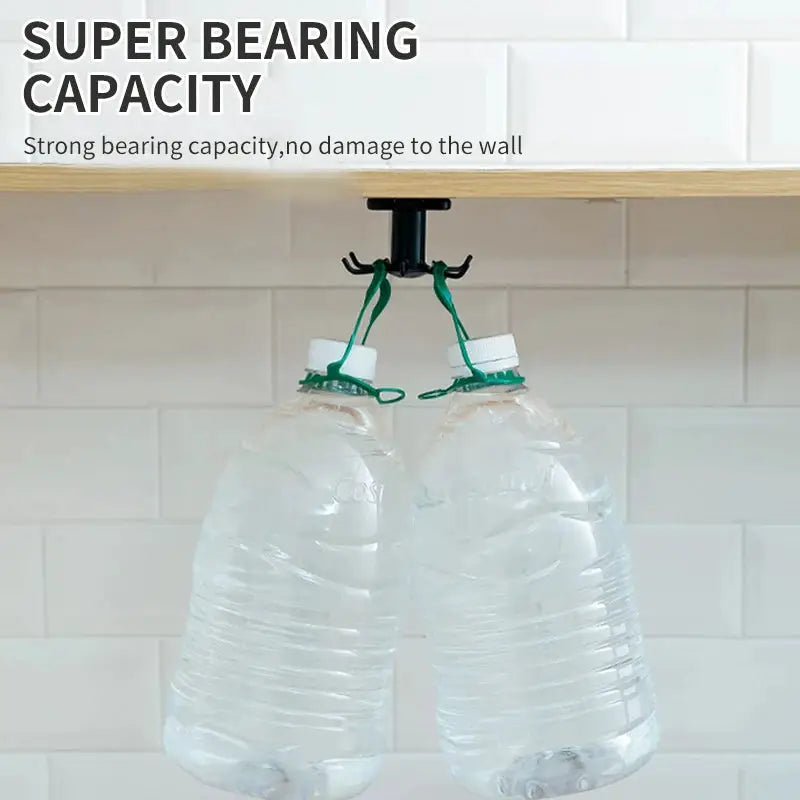 360 rotating adhesive kitchen hook rack under cabinet with green hooks, holding 2 water bottles