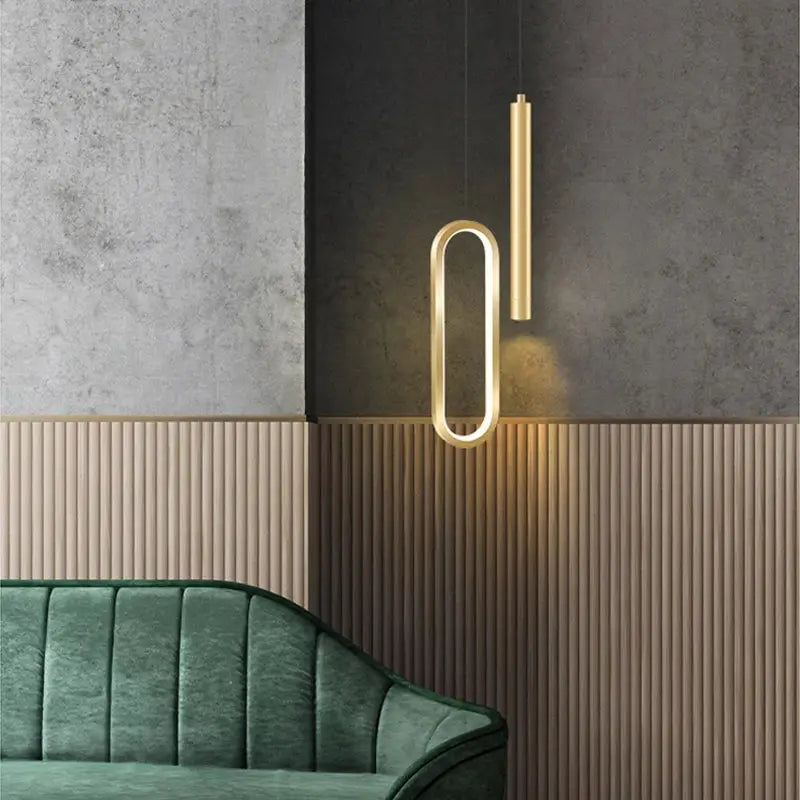 Nordic LED Pendant Light with gold metal finish, oval loop plus slim vertical tube, modern interior lighting