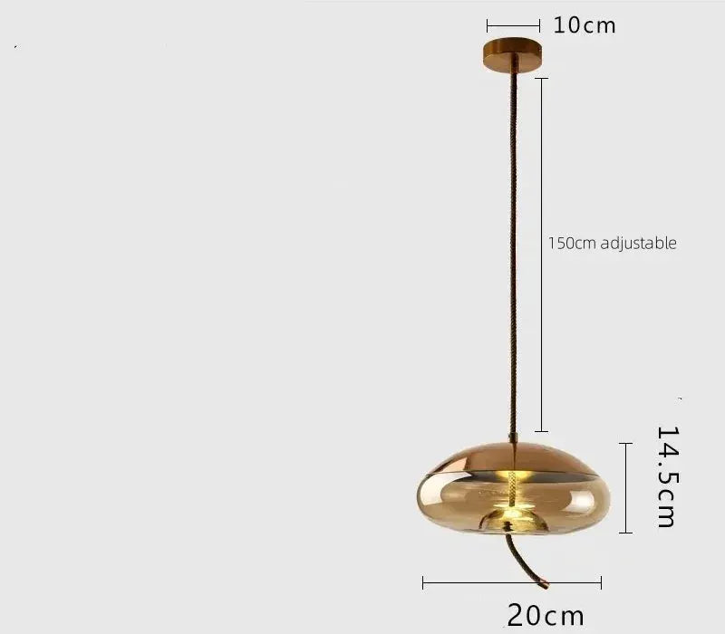 Minimalist pendant lamp by Simples Market with amber glass shade, brown hemp rope, and adjustable cord.