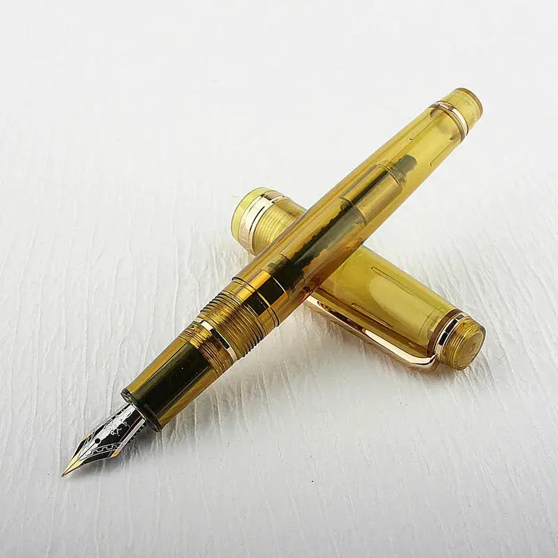Jinhao 82 fountain pen in amber acrylic with gold trim and converter