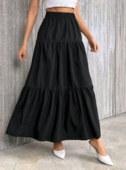Women's black flounce-hem tiered high-waist A-line skirt by Simples Market.