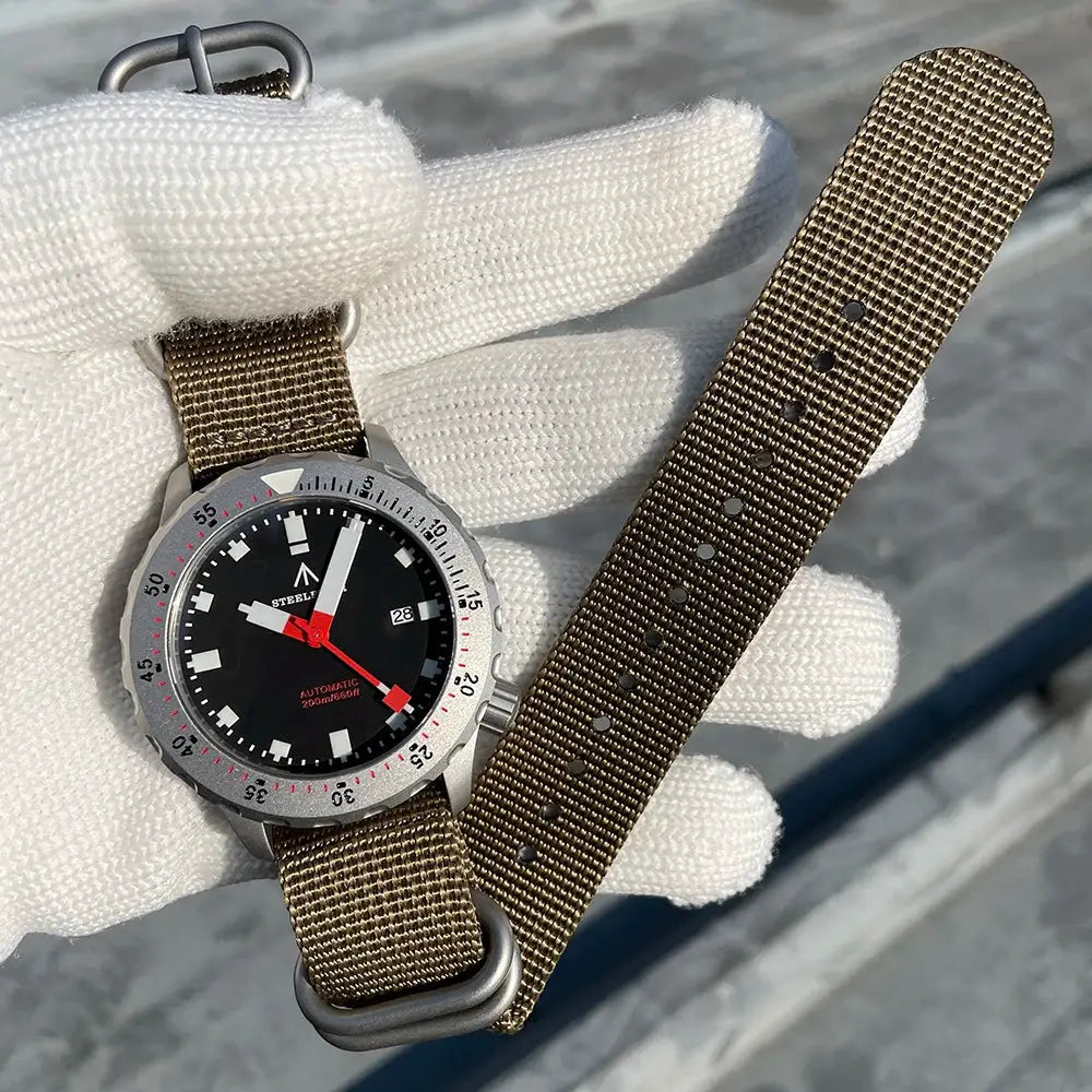 STEELFLIER SF752 watch with brown NATO strap, black dial, date window and luminous markers