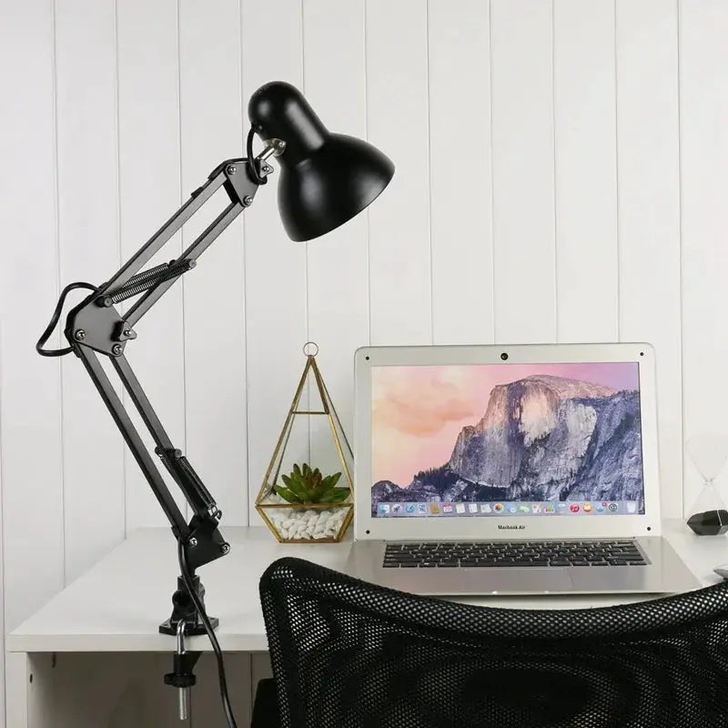 Swing arm clamp desk lamp in black metal with adjustable arms