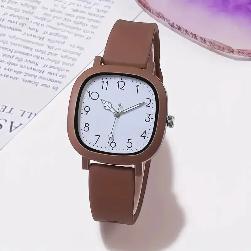 Women's wristwatch with brown silicone band and white Arabic dial