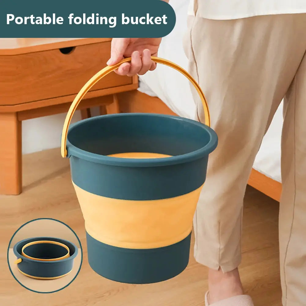 Portable folding silicone bucket with yellow handle, teal body and yellow band