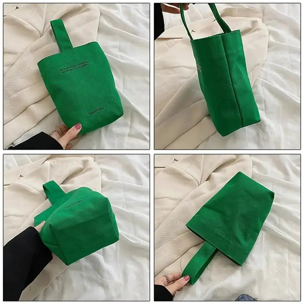 Simples Market green canvas crossbody bag with short handle; compact rectangular shopper purse