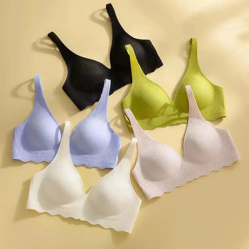 Seamless women's bras set of six in ribbed striped design, assorted colors.