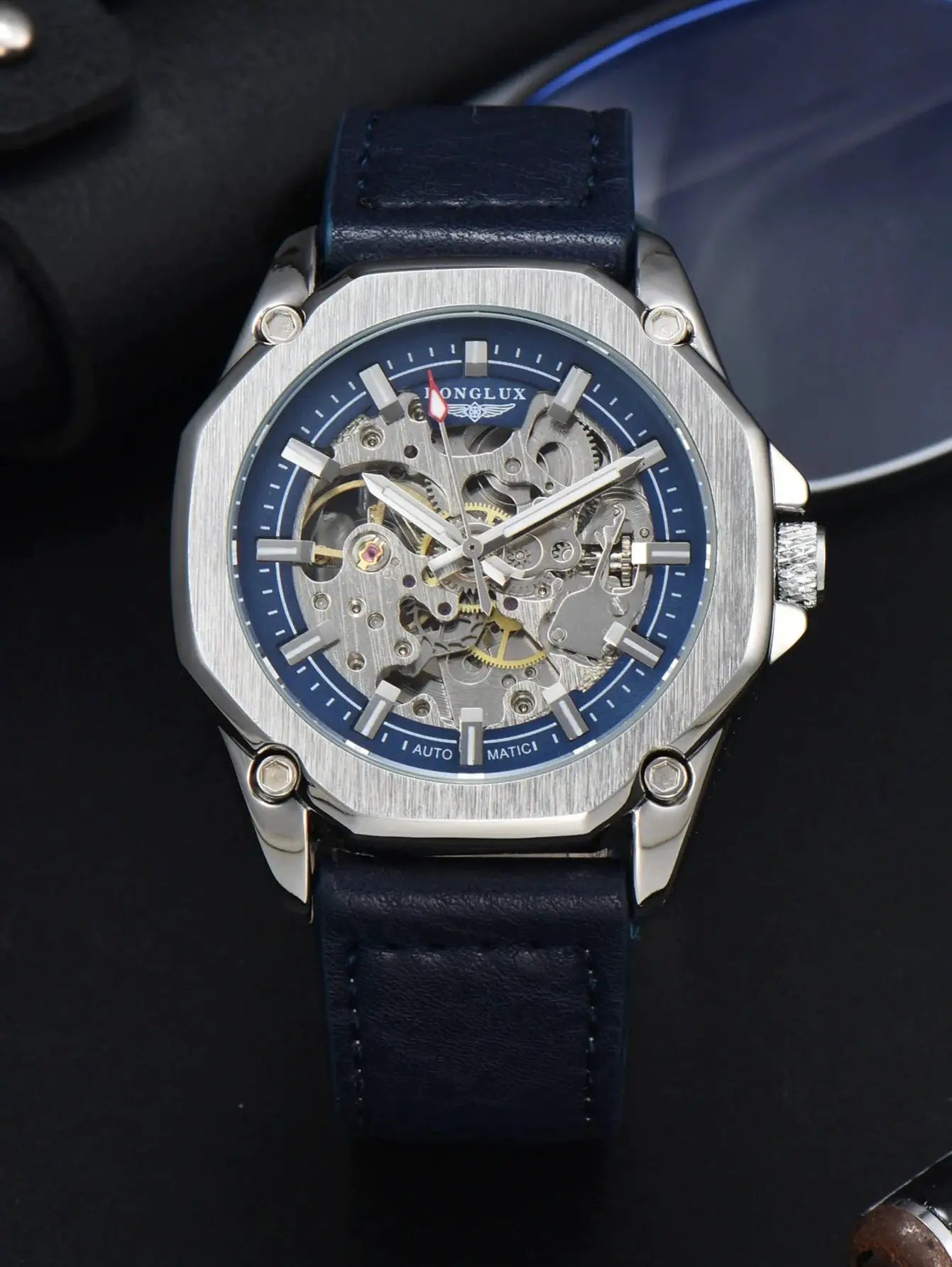 Men's automatic skeleton watch with blue dial, visible gears, and blue leather strap by Simples Market