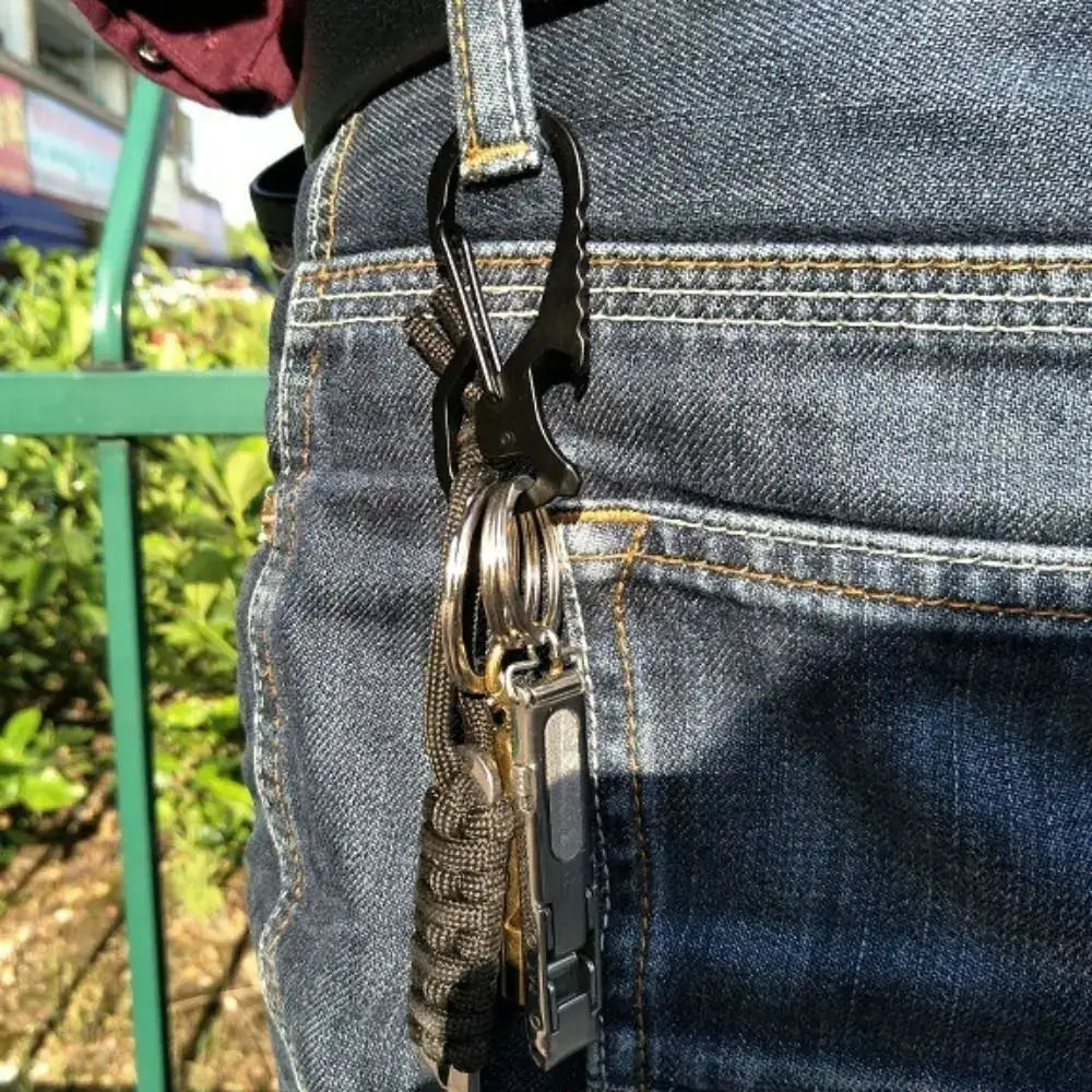 Bottle opener multifunctional carabiner keychain with hex driver, stainless steel, black finish.