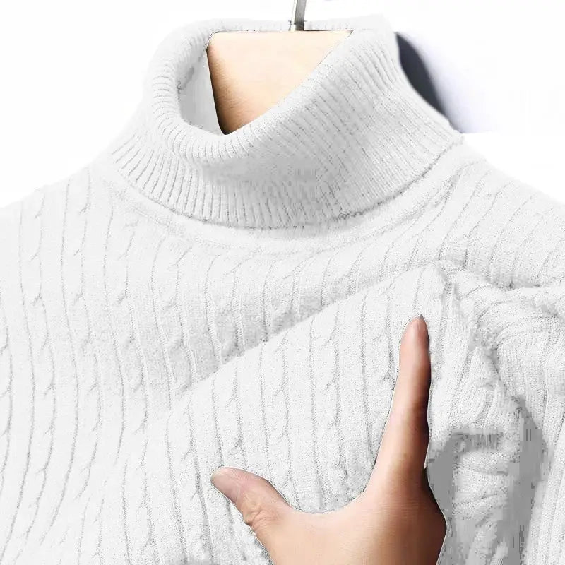 Men's white ribbed turtleneck sweater on hanger; warm, fitted knitted pullover with long sleeves.