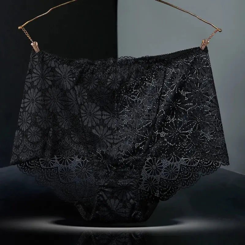 Women’s black high-waisted lace underwear with floral hollow-out pattern on a hanger