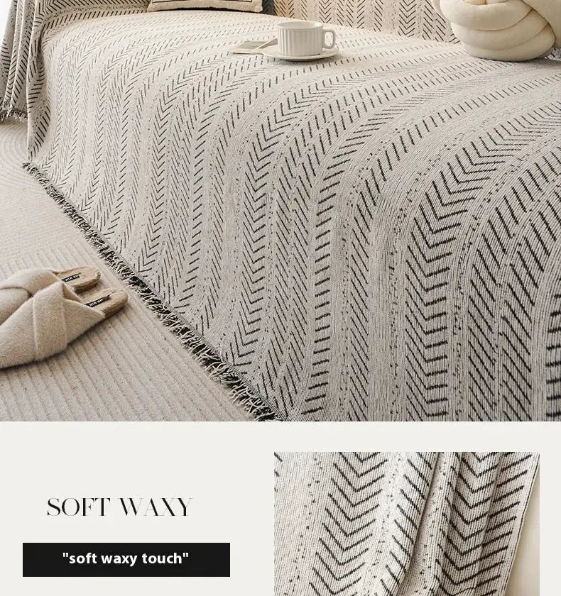 3-seater cream sofa cover with fishbone pattern; non-slip and stain-resistant.