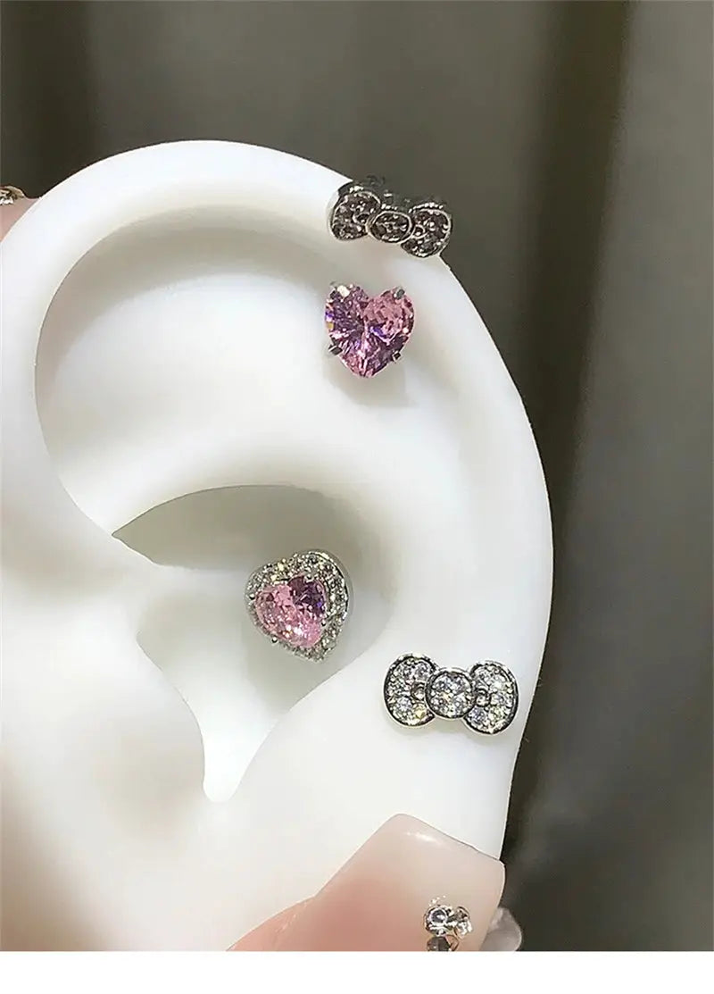 Bowknot and heart zircon earrings set by Simples Market in 316L stainless steel, pink & clear stones