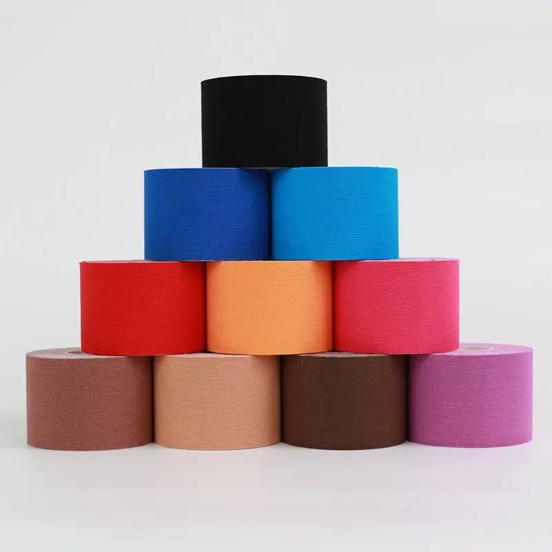 Simples Market kinesiology tape rolls, assorted colors, 5–10 cm wide for athletic recovery.