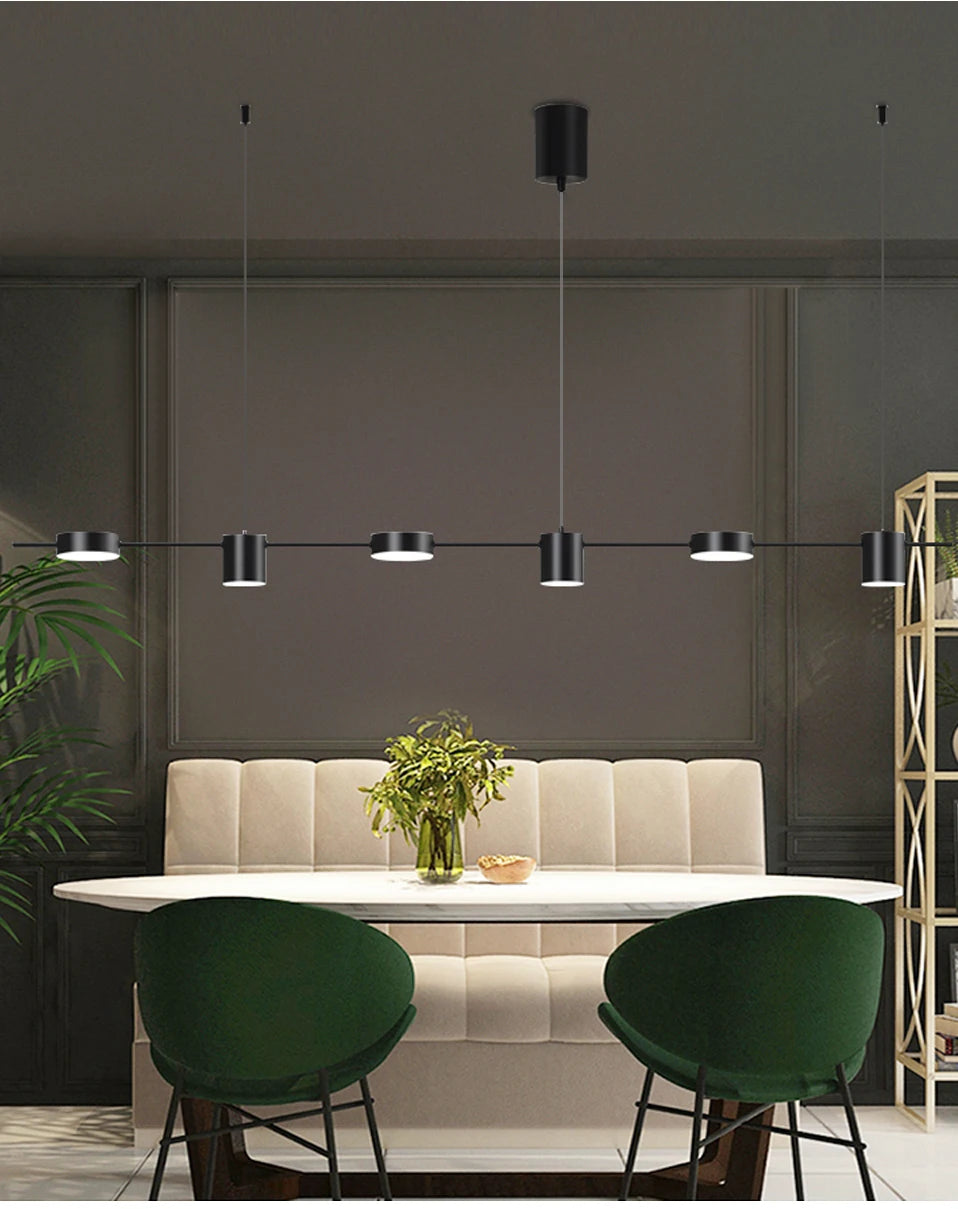 Modern LED linear ceiling chandelier by Simples Market, black metal bar with multiple cylindrical lights, dimmable.
