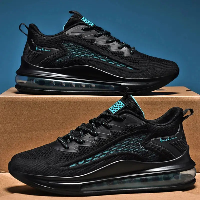 Pair of men's black sneakers with teal accents and breathable mesh upper, air-cushioned sole.