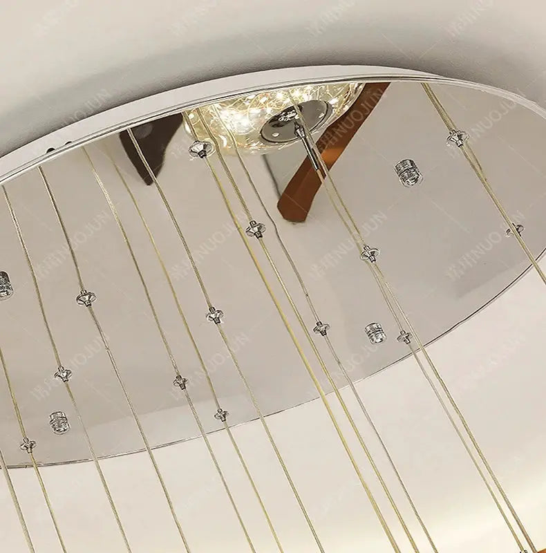 Pendant light with round chrome canopy and gold cords with crystal beads, LED dining room fixture.