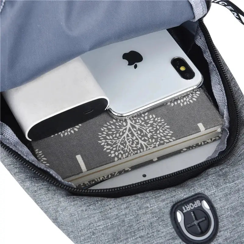 Simples Market gray Oxford cloth chest bag, Korean-style waterproof crossbody with phone, power bank and notebook.