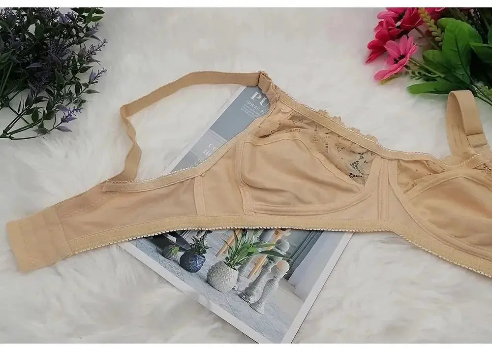 Wire-free beige bra by Simples Market, unlined plus-size with lace trim and adjustable straps