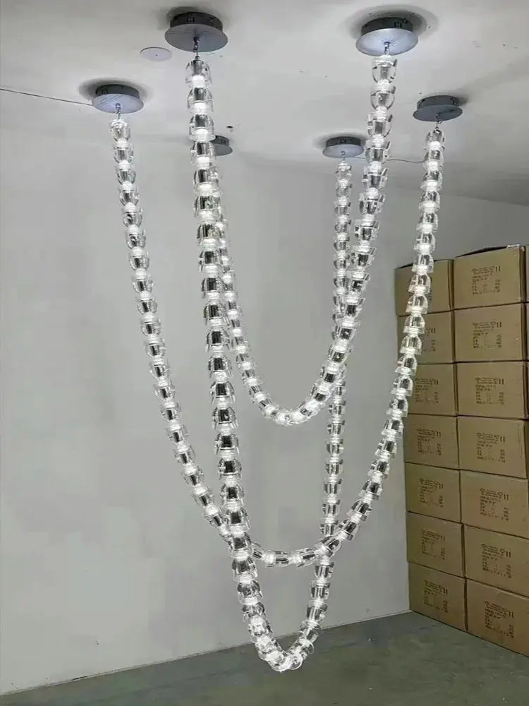 Chandelier ceiling light with four crystal bead strands, adjustable chain length, clear acrylic crystals