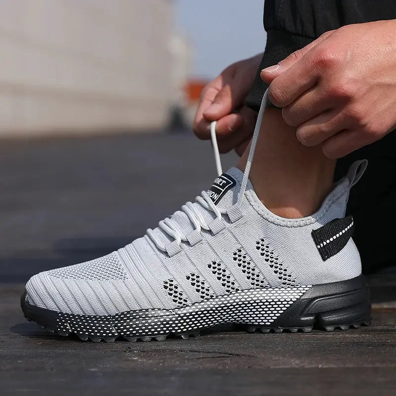 Simples Market men's mesh knit casual sneaker in light gray with black speckled sole and lace-up design.
