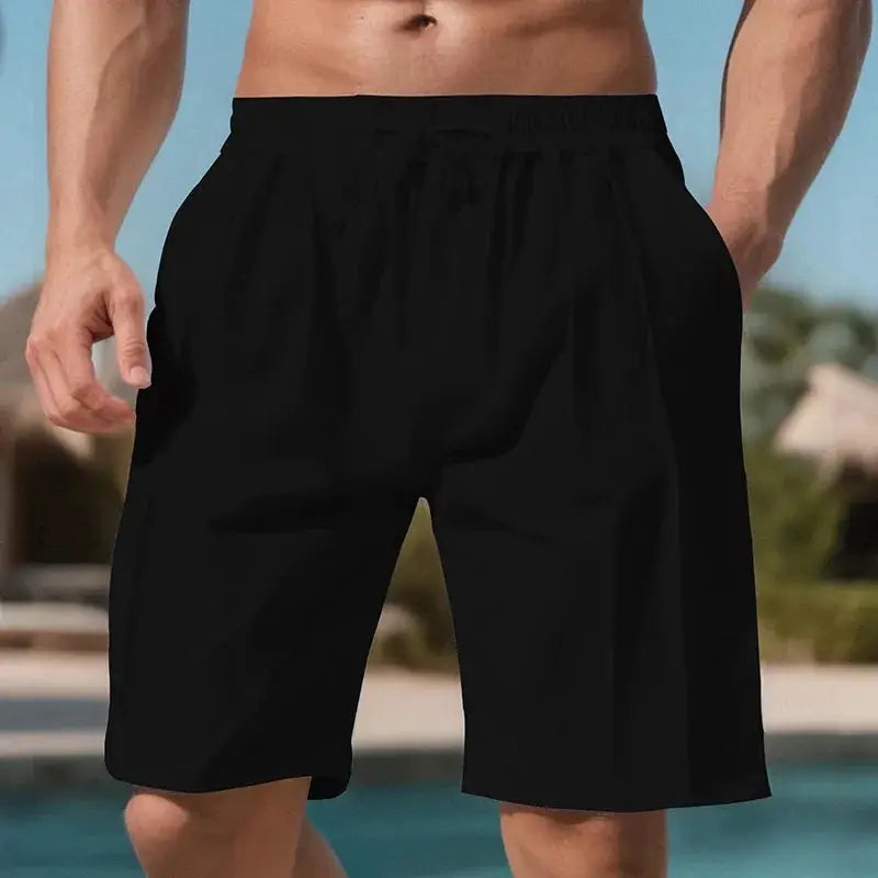 Men's black quick-dry beach shorts with elastic waistband, knee-length, loose fit