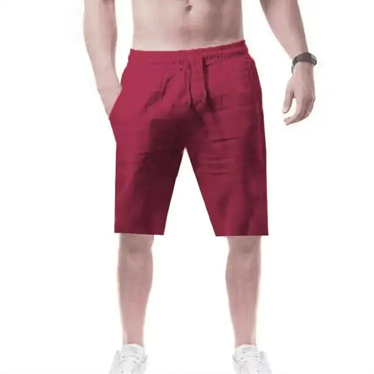 Men's burgundy cotton shorts with drawstring waist and pockets, breathable.