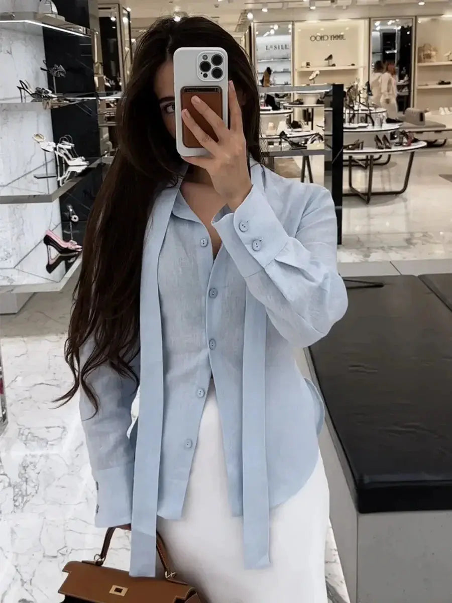 Wolfeel light-blue 100% cotton autumn tie-belt shirt cardigan top worn in a store mirror selfie.