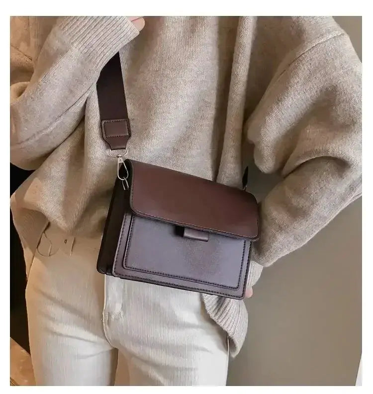 Women PU leather crossbody bag with brown flap and two-tone purple body, compact travel shoulder bag.