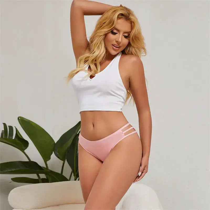 Pink low-rise women's panties with double elastic side straps, soft lingerie