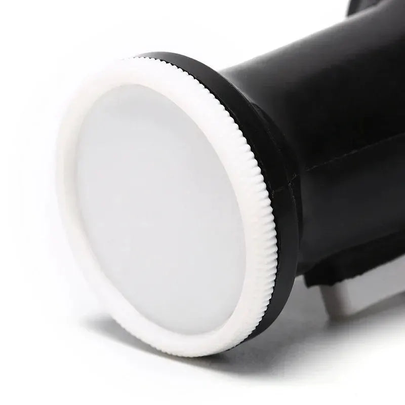 Neck duster brush for hair cutting; white round head with black handle.