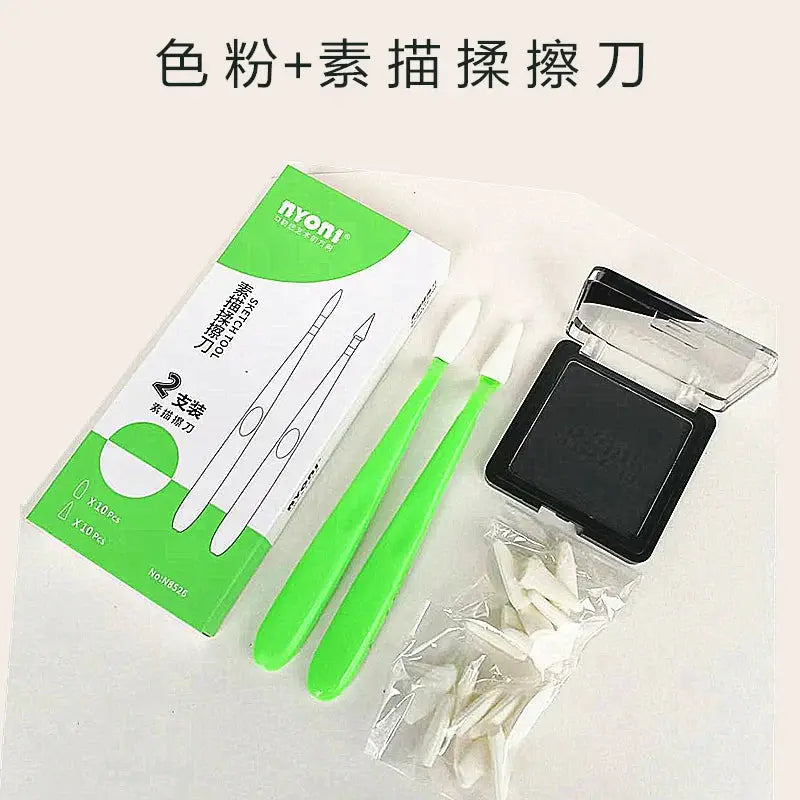 Pastel and charcoal drawing tool set with two green blending tools, ink pad, and nibs from nyon