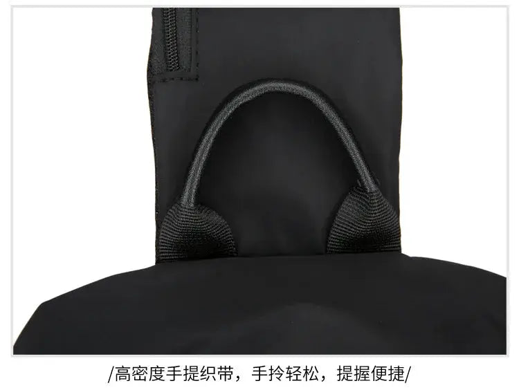 Men's chest bag crossbody in black Oxford cloth with top-handle strap.