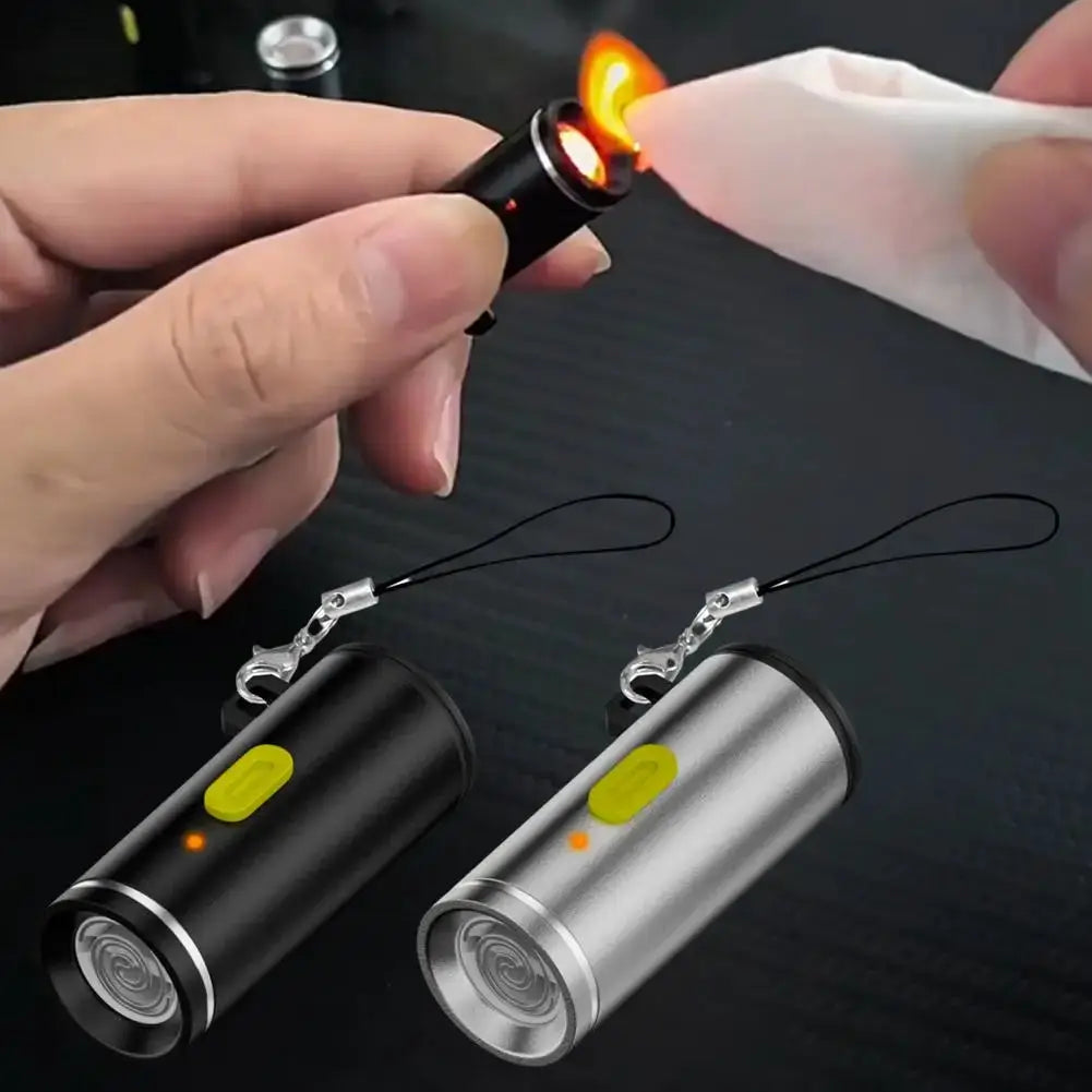 Simples Market Type-C mini windproof lighter; two portable outdoor flame starters in black and silver with keychain loops.