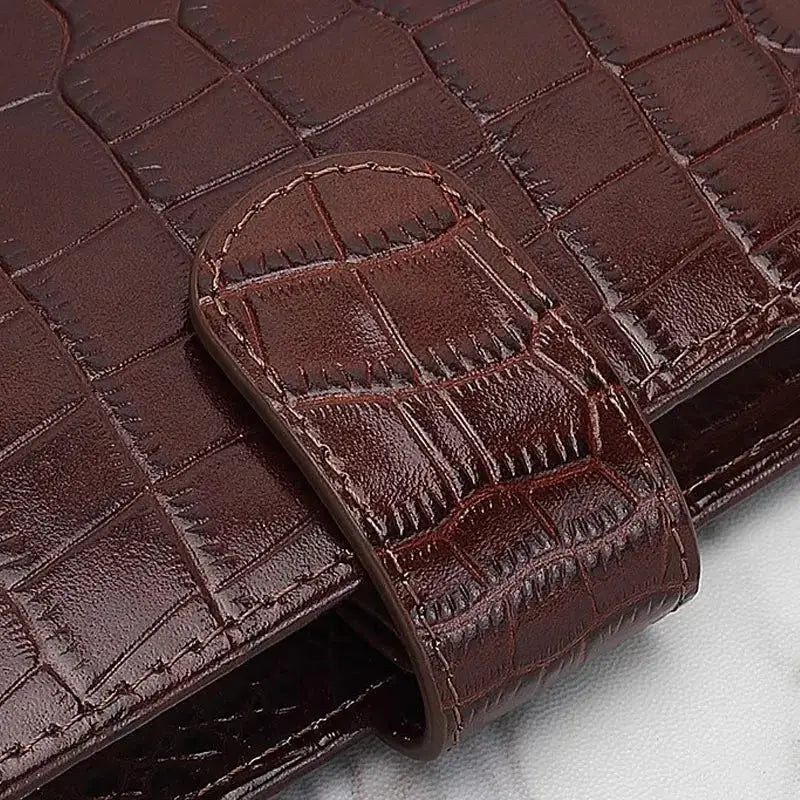Yiwi genuine leather pocket-size planner with crocodile-embossed dark brown cover and strap