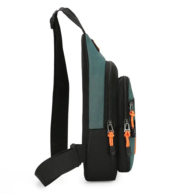 Men's crossbody bag in teal and black, waterproof with multiple zip pockets and an adjustable strap
