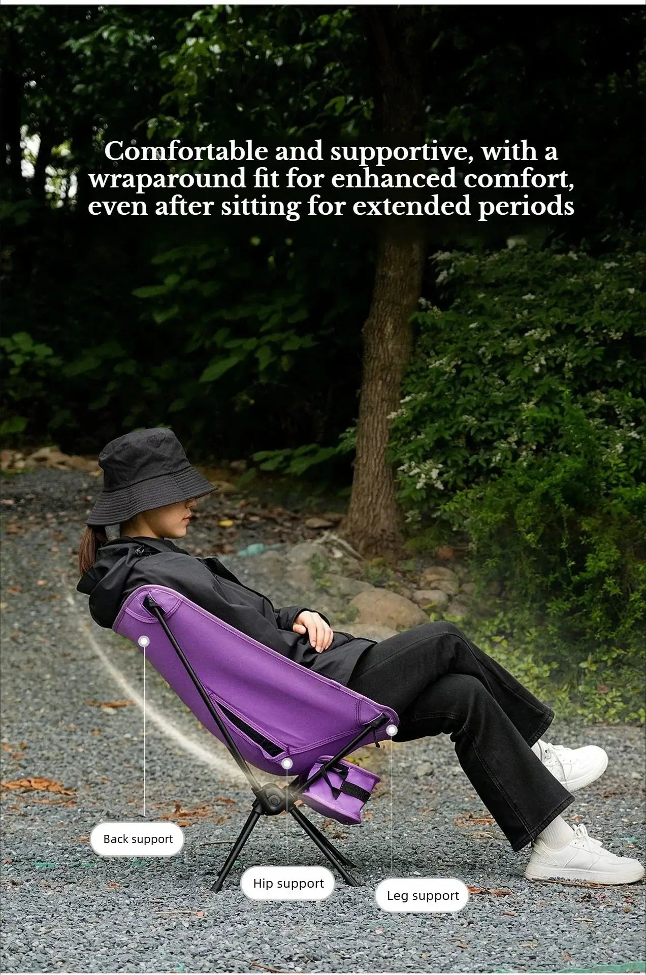 Purple foldable camping chair with back, hip and leg supports for outdoor use.