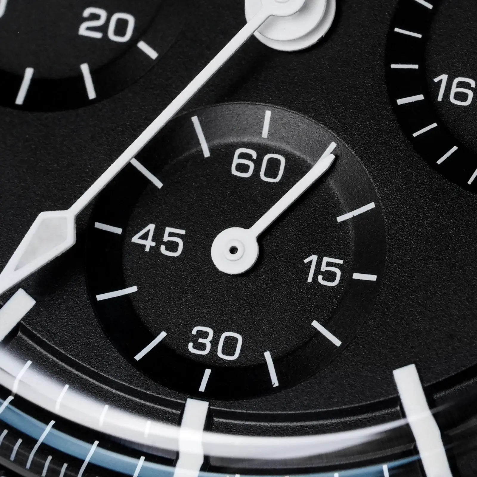 Watchdives WD1863 chronograph watch close-up on black dial with white hands and markers