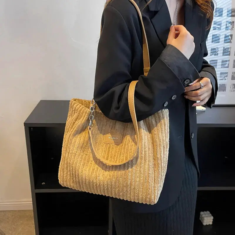Women corduroy shoulder bag by Simples Market, beige large-capacity handbag with fixed strap.
