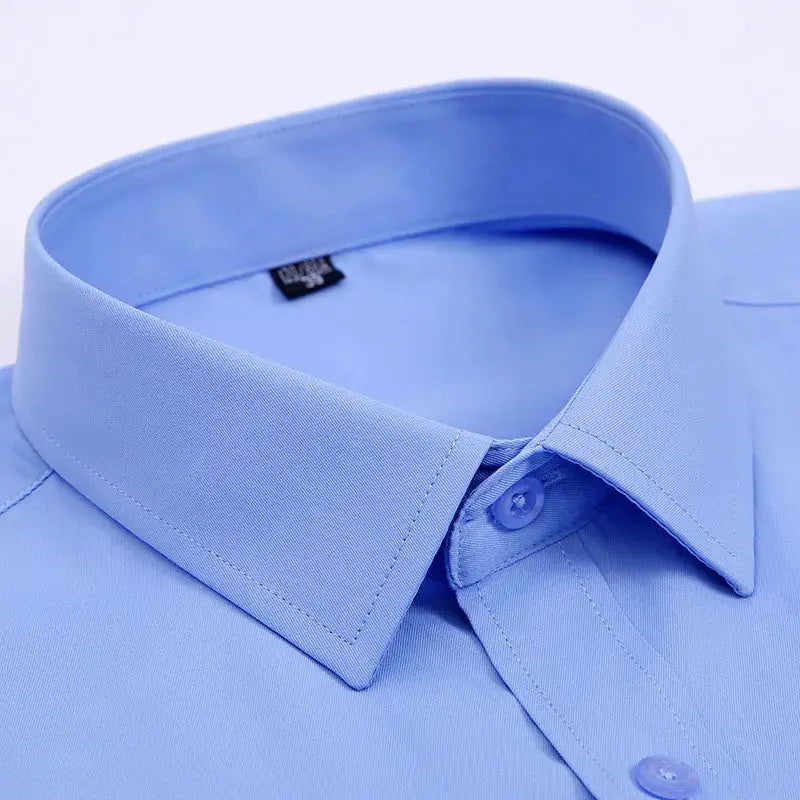 Men's long-sleeve dress shirt in light blue solid color with crisp collar, Simples Market