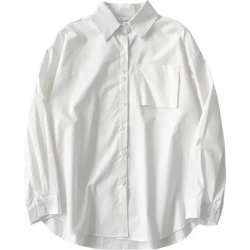 White oversized button-down shirt for women with chest pocket and turn-down collar by Simples Market.